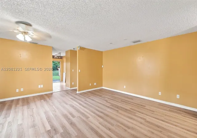 Photo 3 of Townhouse for sale at 1533 W Harmony Lake Cir, Davie, FL 33324 | MLS# A12081221 | Listing updated on 2026-09-02