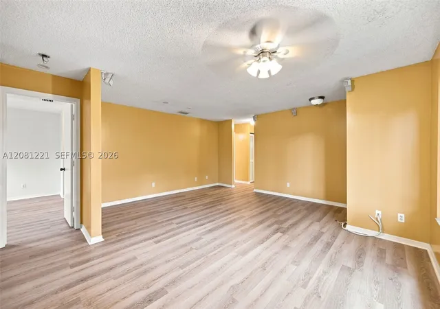 Photo 4 of Townhouse for sale at 1533 W Harmony Lake Cir, Davie, FL 33324 | MLS# A12081221 | Listing updated on 2026-09-02