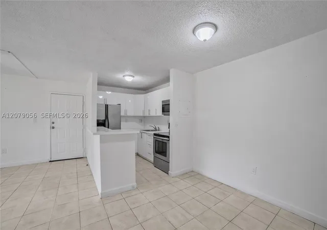 Photo 2 of Condo for sale at 7155 Nw 179th Street #108, Hialeah, FL 33015 | MLS# A12079056 | Listing updated on 2026-09-04