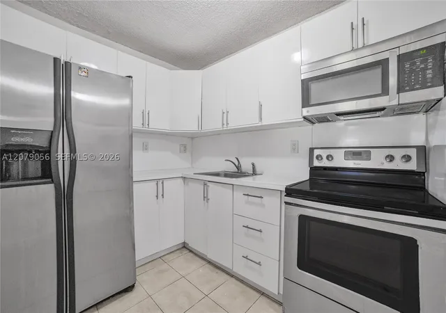 Photo 3 of Condo for sale at 7155 Nw 179th Street #108, Hialeah, FL 33015 | MLS# A12079056 | Listing updated on 2026-09-04