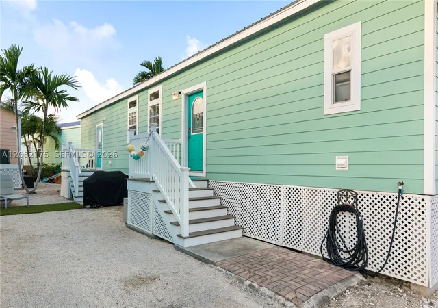Photo 2 of Manufactured home for sale at 5031 5th Avenue, Key West, FL 33040 | MLS# A12082175 | Listing updated on 2026-09-03