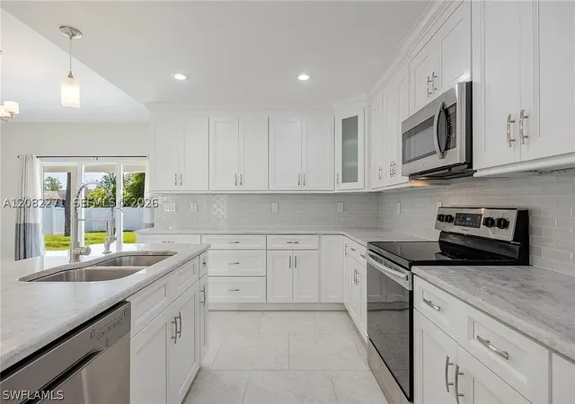 Photo 4 of Single family home for sale at 830 Angelo Ave, Lehigh Acres, FL 33971 | MLS# A12082271 | Listing updated on 2026-09-02
