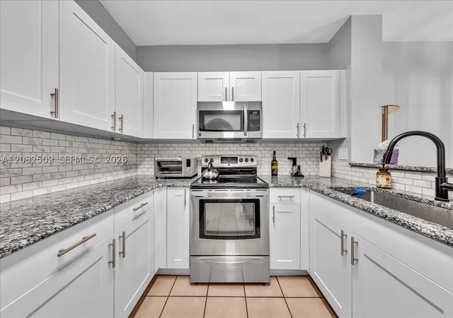 Photo 3 of Townhouse for sale at 12152 SW 4th Street, Pembroke Pines, FL 33025 | MLS# A12082509 | Listing updated on 2026-09-05