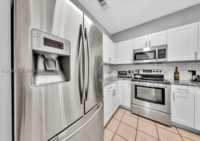 Photo 4 of Townhouse for sale at 12152 SW 4th Street, Pembroke Pines, FL 33025 | MLS# A12082509 | Listing updated on 2026-09-05