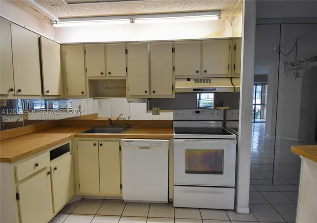 Photo 3 of Condo for sale at 10761 W Clairmont Cir #108, Tamarac, FL 33321 | MLS# A12081919 | Listing updated on 2026-09-03