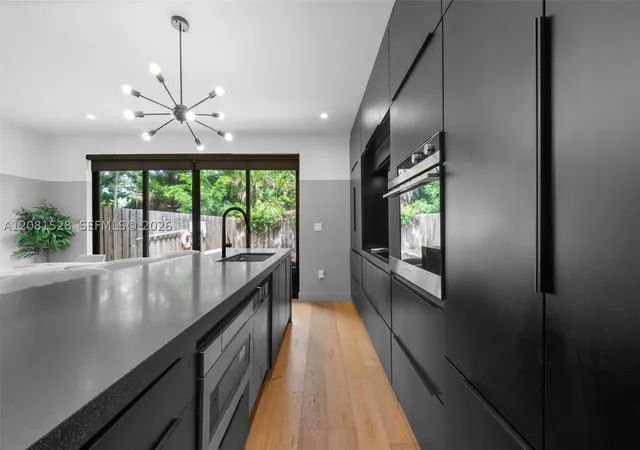 Photo 4 of Townhouse for sale at 257 NW 39th Street #257, Miami, FL 33127 | MLS# A12081528 | Listing updated on 2026-09-03