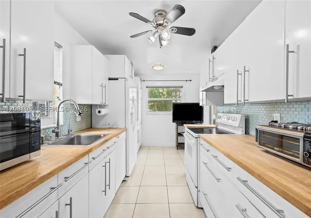 Photo 2 of Condo for sale at 8002 Lagos De Campo Blvd #B-101, Tamarac, FL 33321 | MLS# A12081039 | Listing updated on 2026-09-03