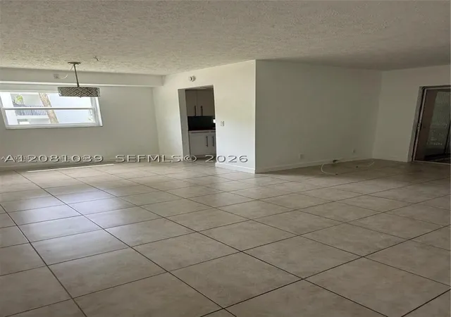 Photo 3 of Condo for sale at 8002 Lagos De Campo Blvd #B-101, Tamarac, FL 33321 | MLS# A12081039 | Listing updated on 2026-09-03