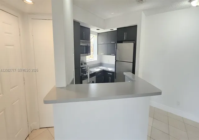 Photo 3 of Condo for sale at 3380 N Pinewalk Dr #1111, Margate, FL 33063 | MLS# A12082777 | Listing updated on 2026-09-03