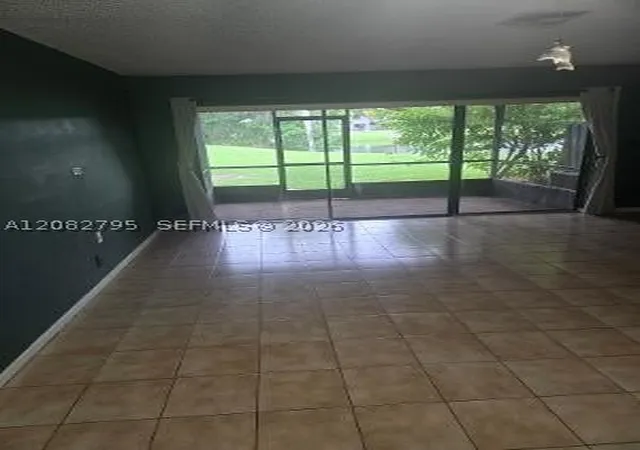 Photo 2 of Townhouse for sale at 3313 S Carambola Cir #2401, Coconut Creek, FL 33066 | MLS# A12082795 | Listing updated on 2026-09-15