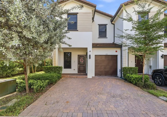 Photo 1 of Townhouse for sale at 201 Sw 159th Way, Pembroke Pines, FL 33027 | MLS# A12082821 | Listing updated on 2026-09-04