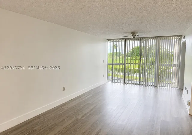Photo 1 of Condo for sale at 6955 Nw 186th Street #F205, Hialeah, FL 33015 | MLS# A12080721 | Listing updated on 2026-09-26