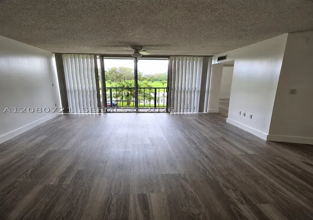 Photo 2 of Condo for sale at 6955 Nw 186th Street #F205, Hialeah, FL 33015 | MLS# A12080721 | Listing updated on 2026-09-26