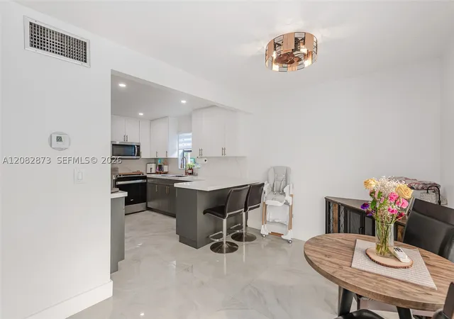 Photo 3 of Townhouse for sale at 7101 SW 113th Avenue, Miami, FL 33173 | MLS# A12082873 | Listing updated on 2026-09-14