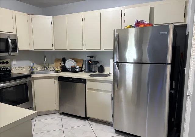 Photo 3 of Condo for sale at 718 Sunny Pine Way #F2, Green Acres, FL 33415 | MLS# A12080772 | Listing updated on 2026-09-11