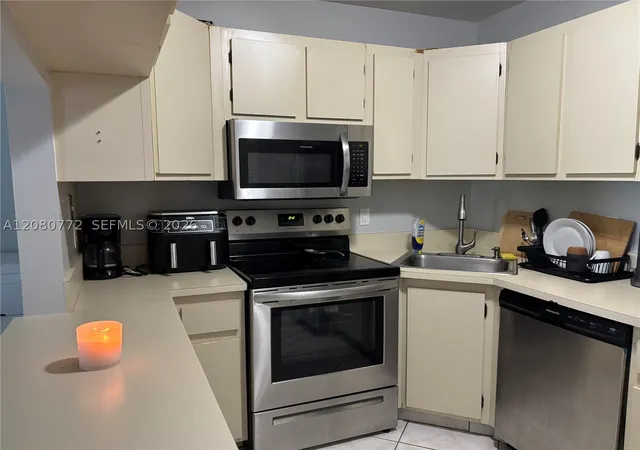 Photo 3 of Condo for sale at 718 Sunny Pine Way #F2, Green Acres, FL 33415 | MLS# A12080772 | Listing updated on 2026-09-11