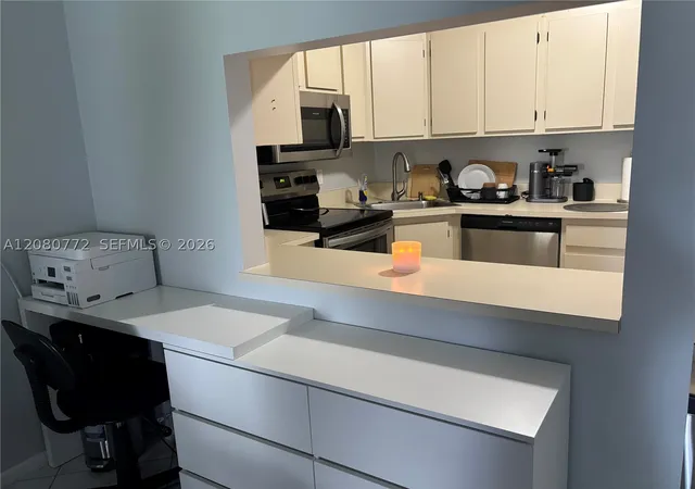 Photo 4 of Condo for sale at 718 Sunny Pine Way #F2, Green Acres, FL 33415 | MLS# A12080772 | Listing updated on 2026-09-11