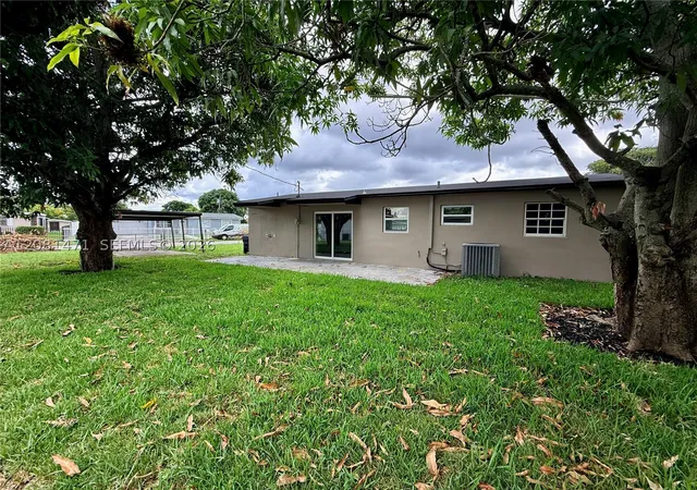 Photo 4 of Single family home for sale at 21002 NW 34th Court, Miami Gardens, FL 33056 | MLS# A12081471 | Listing updated on 2026-09-15