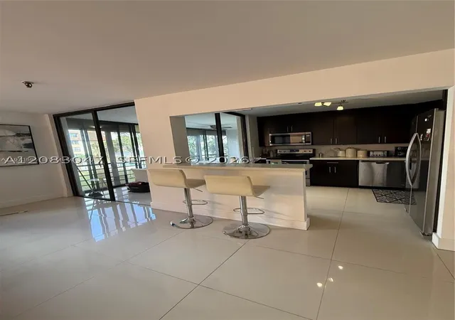 Photo 2 of Condo for sale at 671 Ne 195th Street #227-E, Miami, FL 33179 | MLS# A12083047 | Listing updated on 2026-09-07