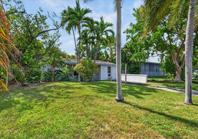 Photo 3 of Single family home for sale at 5619 NE 6th Avenue, Oakland Park, FL 33334 | MLS# A12083076 | Listing updated on 2026-09-04