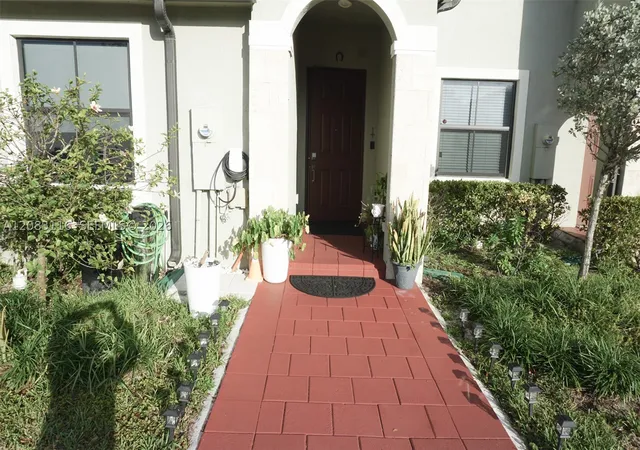Photo 1 of Townhouse for sale at 10589 W 32nd Lane, Hialeah Gardens, FL 33018 | MLS# A12083116 | Listing updated on 2026-09-11