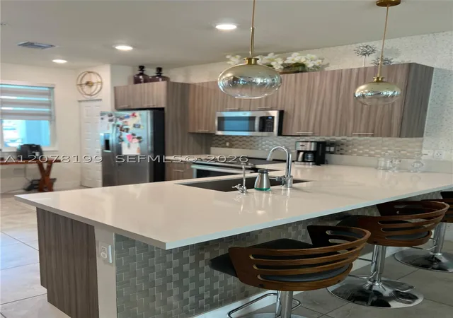 Photo 3 of Townhouse for sale at 6421 NW 102nd Path #101, Doral, FL 33178 | MLS# A12078199 | Listing updated on 2026-09-04