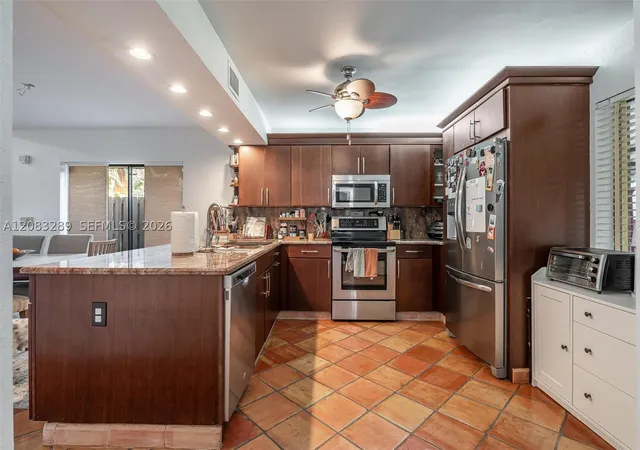 Photo 1 of Townhouse for sale at 1427 Sw 109th Way, Davie, FL 33324 | MLS# A12083289 | Listing updated on 2026-09-06