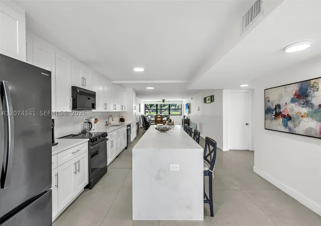 Photo 2 of Condo for sale at 2606 Nw 104th Avenue #102, Sunrise, FL 33322 | MLS# A12074341 | Listing updated on 2026-09-09