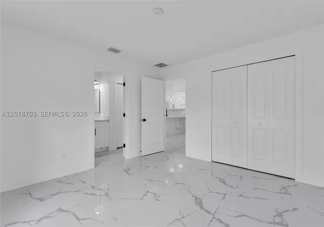 Photo 3 of Multi family home for sale at 104/106 Hightower Ave S, Lehigh Acres, FL 33973 | MLS# A12078703 | Listing updated on 2026-09-04