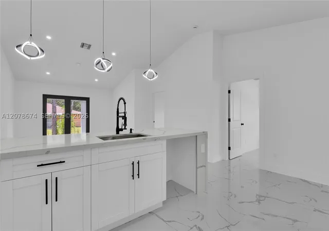 Photo 1 of Multi family home for sale at 105/107 Meadow Rd, Lehigh Acres, FL 33973 | MLS# A12078674 | Listing updated on 2026-09-04