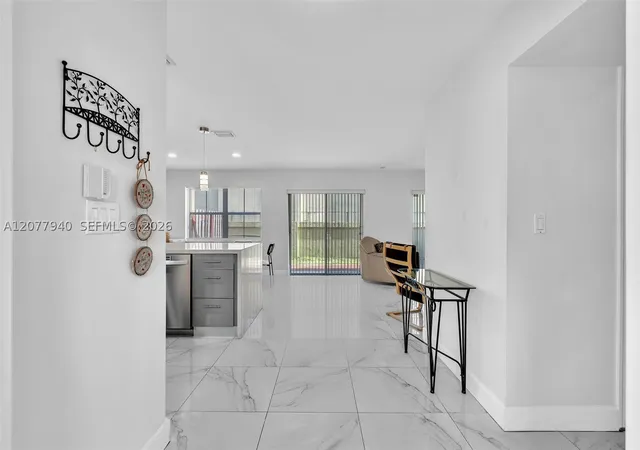 Photo 3 of Condo for sale at 13949 N Forest Oak Cir, Davie, FL 33325 | MLS# A12077940 | Listing updated on 2026-09-04