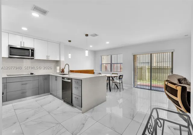 Photo 4 of Condo for sale at 13949 N Forest Oak Cir, Davie, FL 33325 | MLS# A12077940 | Listing updated on 2026-09-04