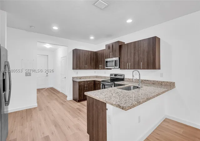 Photo 4 of Townhouse for sale at 1426 SE 24th Terrace, Homestead, FL 33035 | MLS# A12080553 | Listing updated on 2026-09-14