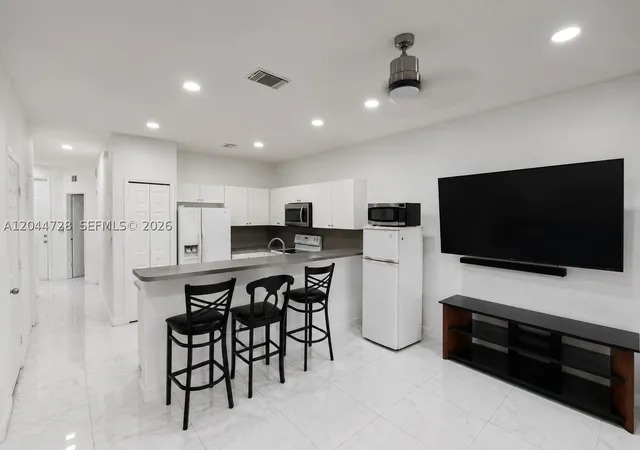 Photo 4 of Townhouse for sale at 9133 SW 152nd Path, Miami, FL 33196 | MLS# A12044728 | Listing updated on 2026-09-08