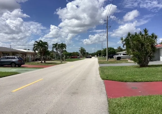 Photo 4 of Single family home for sale at 4915 NW 47th Terrace, Tamarac, FL 33319 | MLS# A12082732 | Listing updated on 2026-09-04