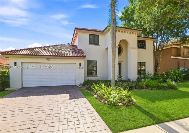 Photo 2 of Single family home for sale at 7320 Nw 68th Way, Parkland, FL 33067 | MLS# A12083626 | Listing updated on 2026-09-30