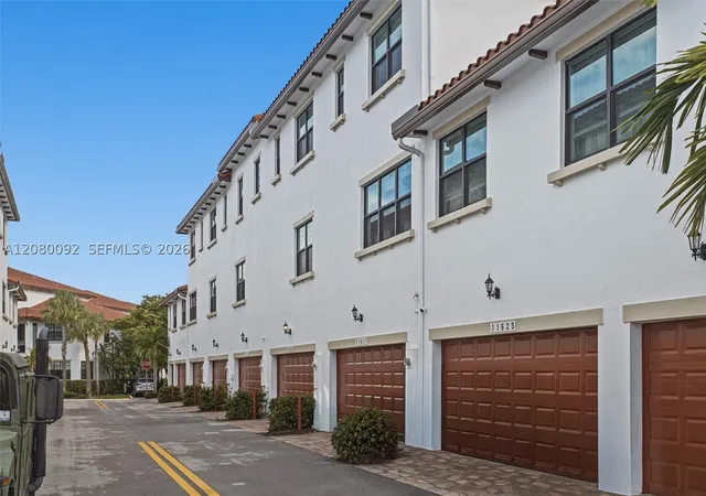 Photo 3 of Townhouse for sale at 11621 SW 13th Court, Pembroke Pines, FL 33025 | MLS# A12080092 | Listing updated on 2026-09-13