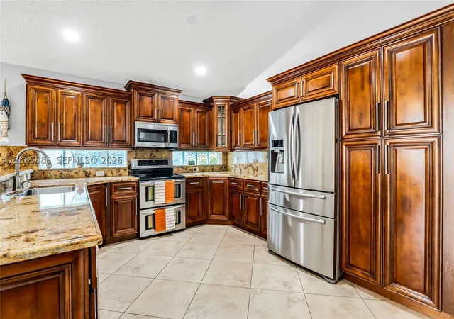 Photo 3 of Single family home for sale at 1387 Sw 181st Avenue, Pembroke Pines, FL 33029 | MLS# A12083686 | Listing updated on 2026-09-12