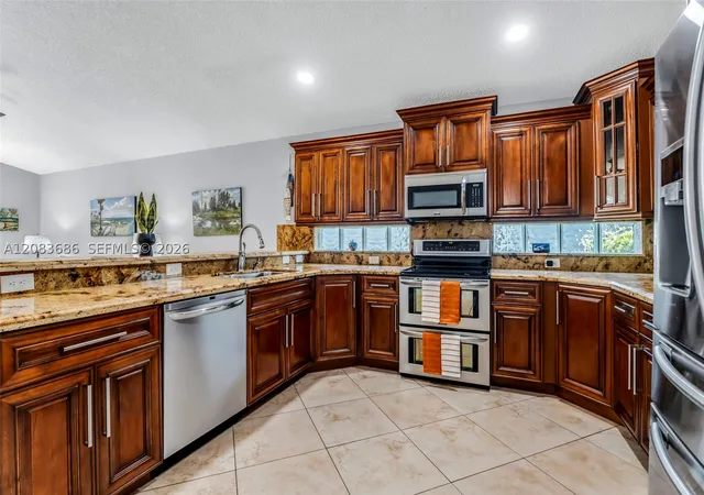 Photo 3 of Single family home for sale at 1387 SW 181st Avenue, Pembroke Pines, FL 33029 | MLS# A12083686 | Listing updated on 2026-09-12