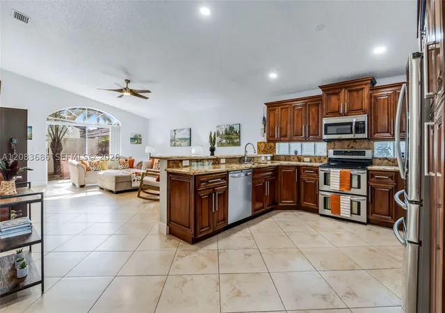 Photo 4 of Single family home for sale at 1387 SW 181st Avenue, Pembroke Pines, FL 33029 | MLS# A12083686 | Listing updated on 2026-09-12