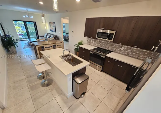 Photo 2 of Condo for sale at 8301 Nw 41st Street #B-402, Doral, FL 33166 | MLS# A12083845 | Listing updated on 2026-09-04