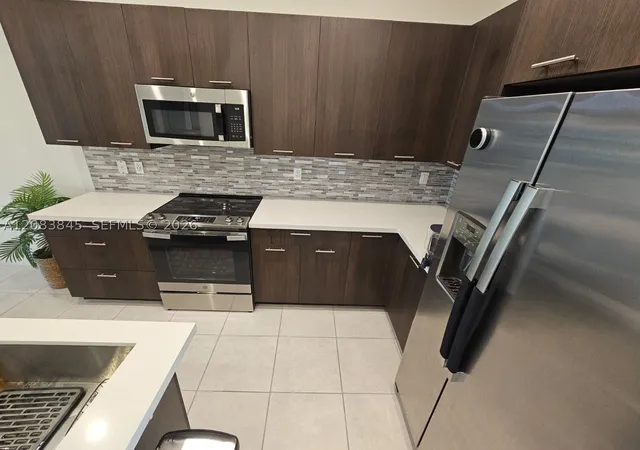 Photo 3 of Condo for sale at 8301 NW 41st Street #B-402, Doral, FL 33166 | MLS# A12083845 | Listing updated on 2026-09-04