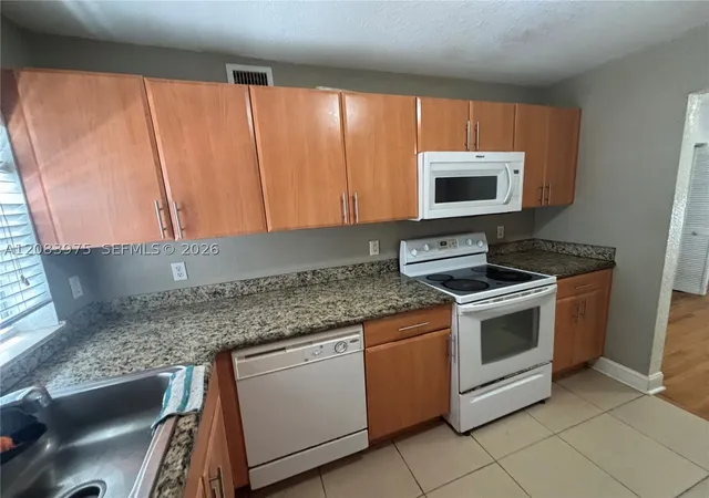 Photo 4 of Condo for sale at 1150 103rd Street #2, Bay Harbor Islands, FL 33154 | MLS# A12083975 | Listing updated on 2026-09-05