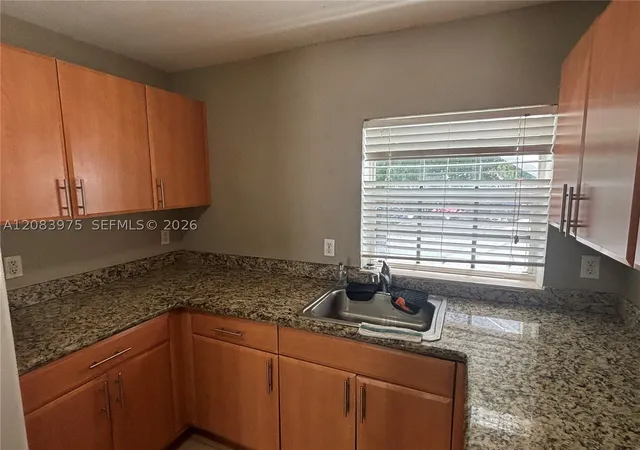 Listing Photo 2 - Condo for sale in building located at 1150 103Rd St, Bay Harbor Islands, FL 33154 - Unit #2