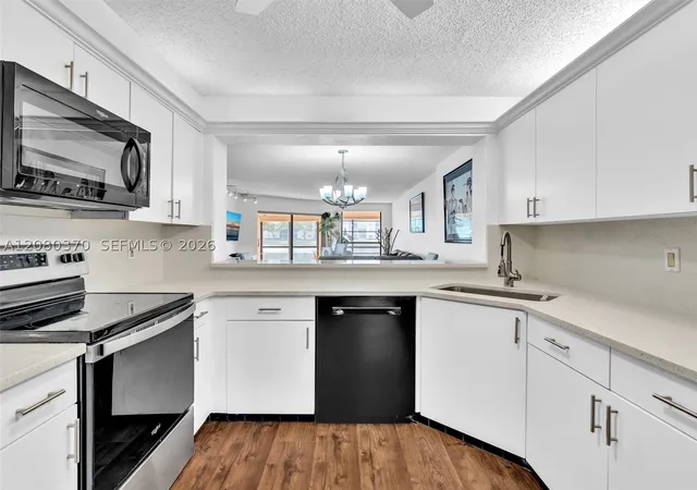 Photo 2 of Condo for sale at 7518 Fairfax Dr #110, Tamarac, FL 33321 | MLS# A12080370 | Listing updated on 2026-09-07