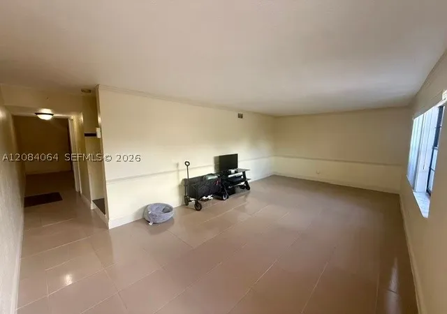 Photo 3 of Condo for sale at 12 Meacham Ln #12, Tamarac, FL 33319 | MLS# A12084064 | Listing updated on 2026-09-14