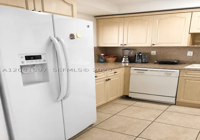 Photo 2 of Condo for sale at 10090 Nw 80th Court #1561, Hialeah Gardens, FL 33016 | MLS# A12081597 | Listing updated on 2026-09-26