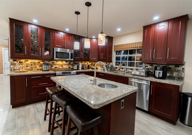 Photo 3 of Single family home for sale at 15420 SW 156th Terrace, Miami, FL 33187 | MLS# A12078236 | Listing updated on 2026-09-13