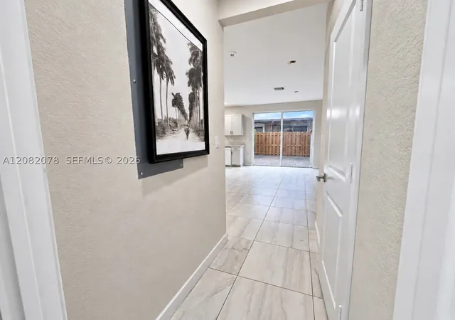 Photo 3 of Townhouse for sale at 2419 Se 11th Street, Homestead, FL 33035 | MLS# A12082078 | Listing updated on 2026-09-11