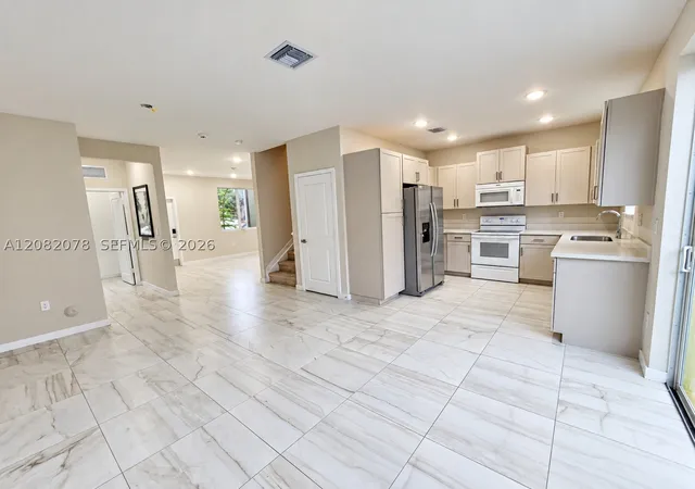 Photo 3 of Townhouse for sale at 2419 SE 11th Street, Homestead, FL 33035 | MLS# A12082078 | Listing updated on 2026-09-11